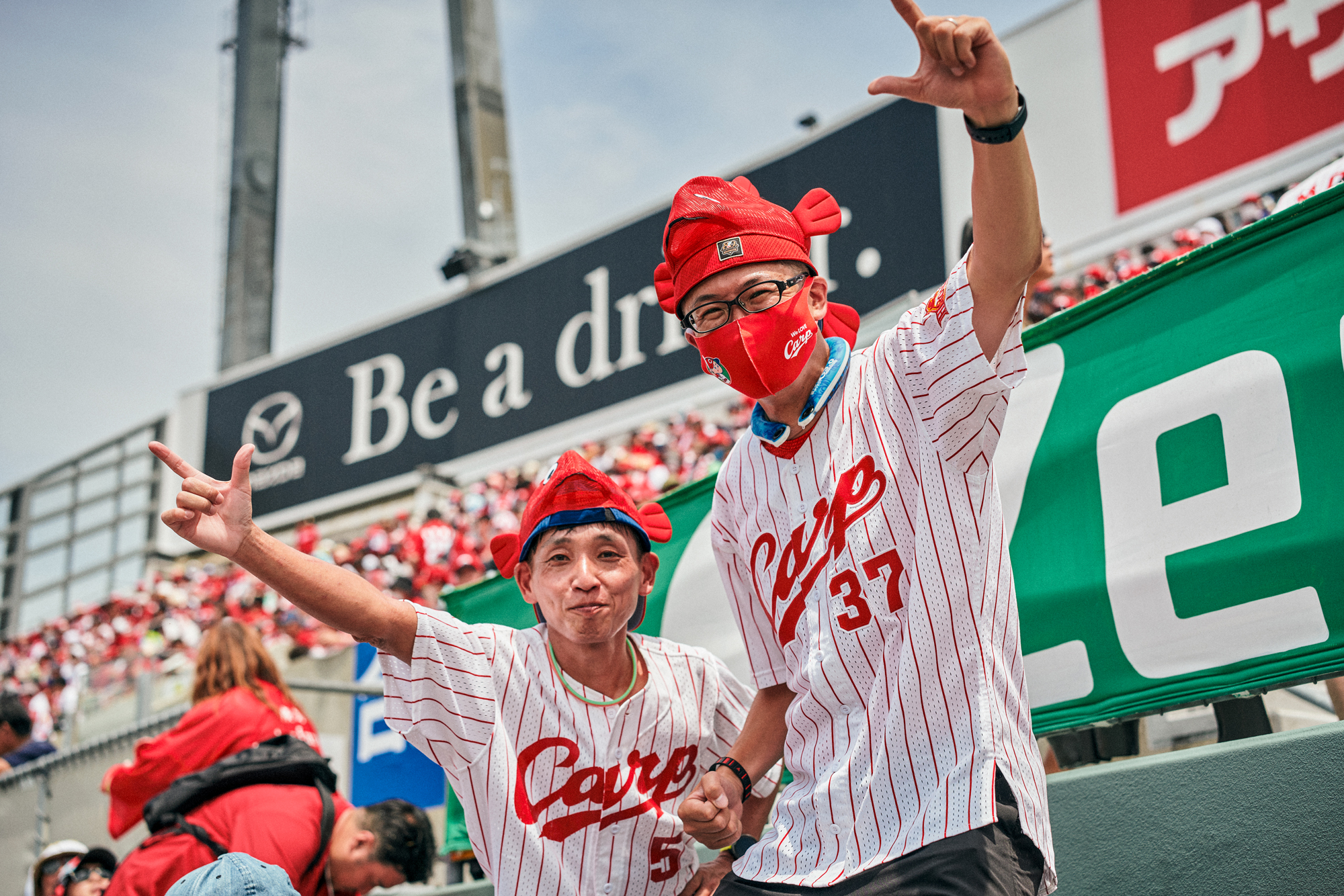 Members of Hiroshima Toyo Carp celebrate after winning the Central